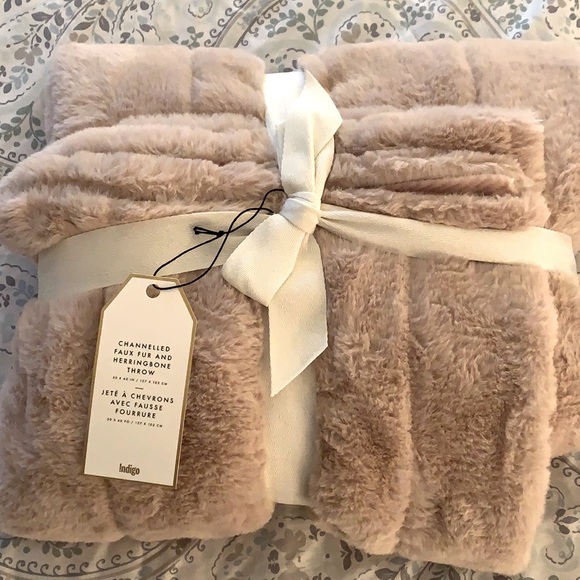 Faux fur and herringbone throw.